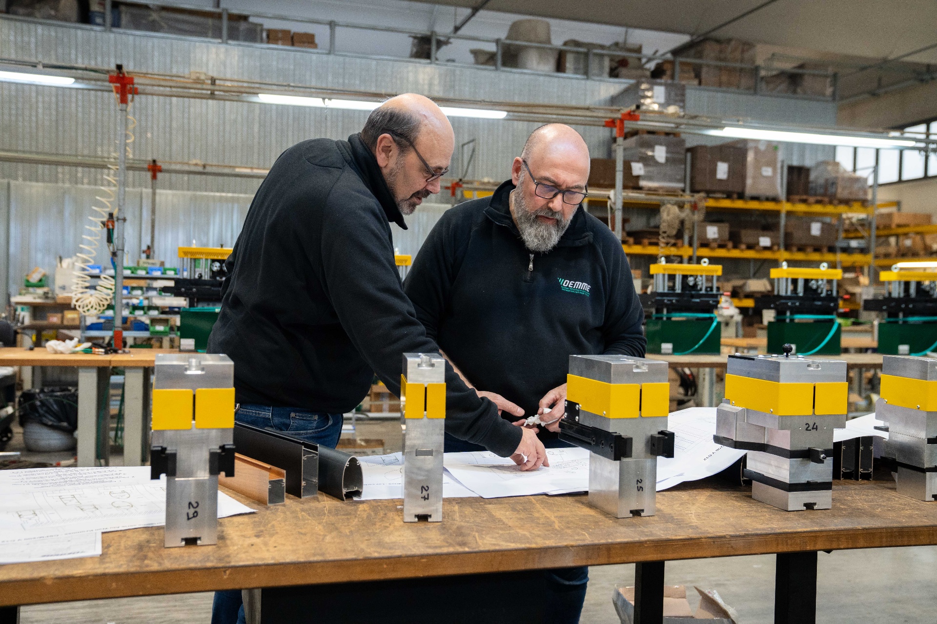 OEMME team working in the workshop